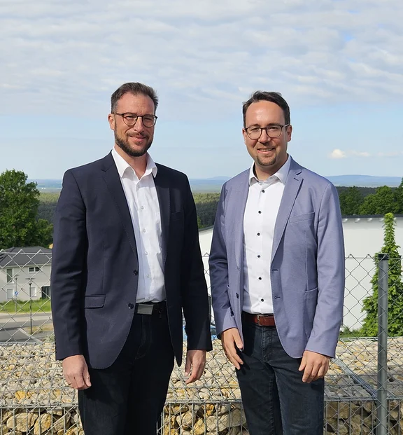 Andreas Neugirg und Dr. Christian Weiß von Sozialteam.